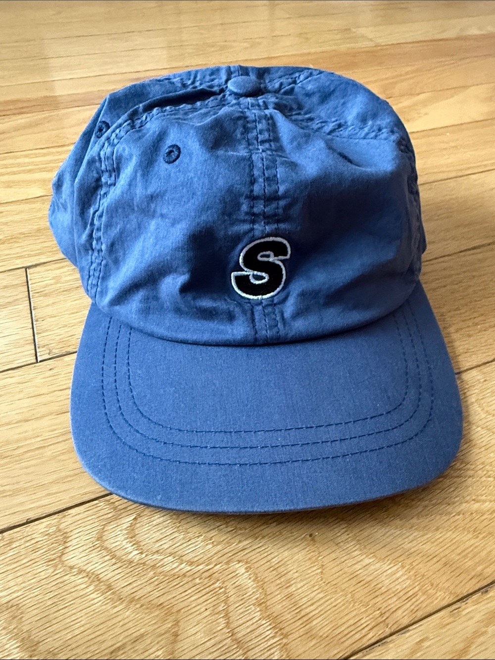 Stussy navy blue relaxed cap with 'S' logo